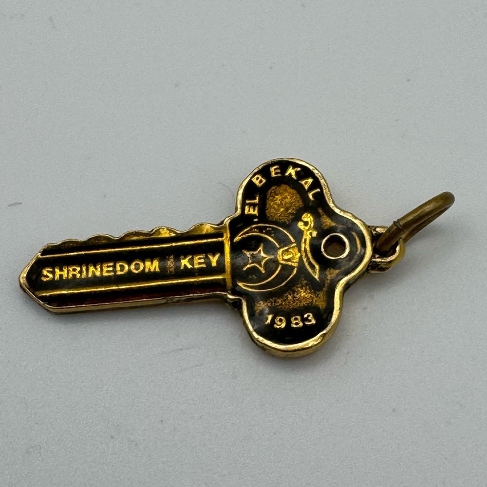 Vintage Tiny Shriners Hospital Key Pendant Collectible Black Gold 1983